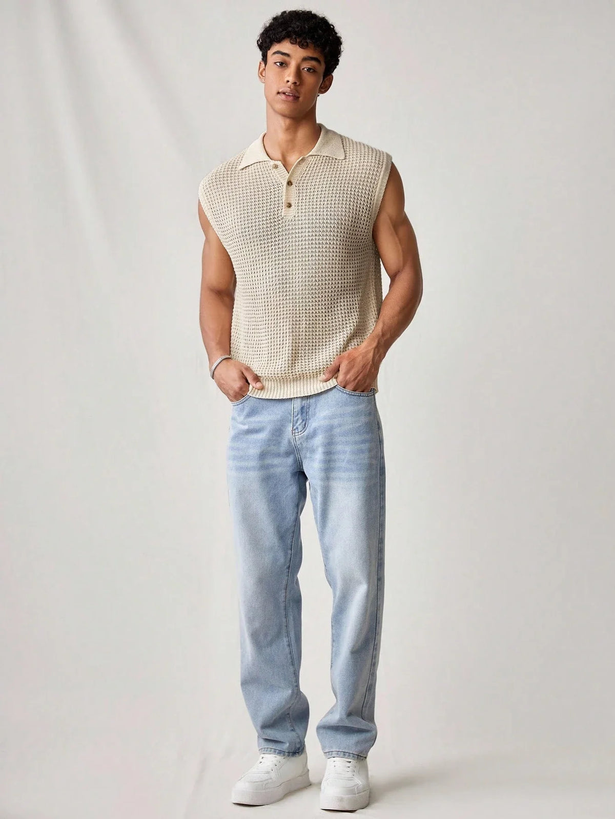 Ärmelloses Herren-Poloshirt aus Strick mit Pointelle-Durchbruchmuster, Schwarz