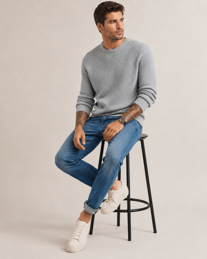 سترة محاكة منظّمة بأكمام طويلة